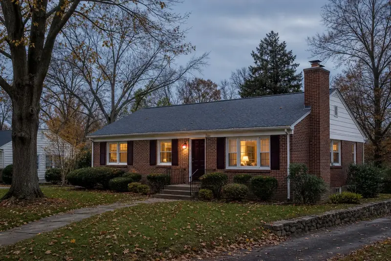 A 1960s brick rambler with a brick chimney with a stainless steel cap and neat mortar joints; illustrative image