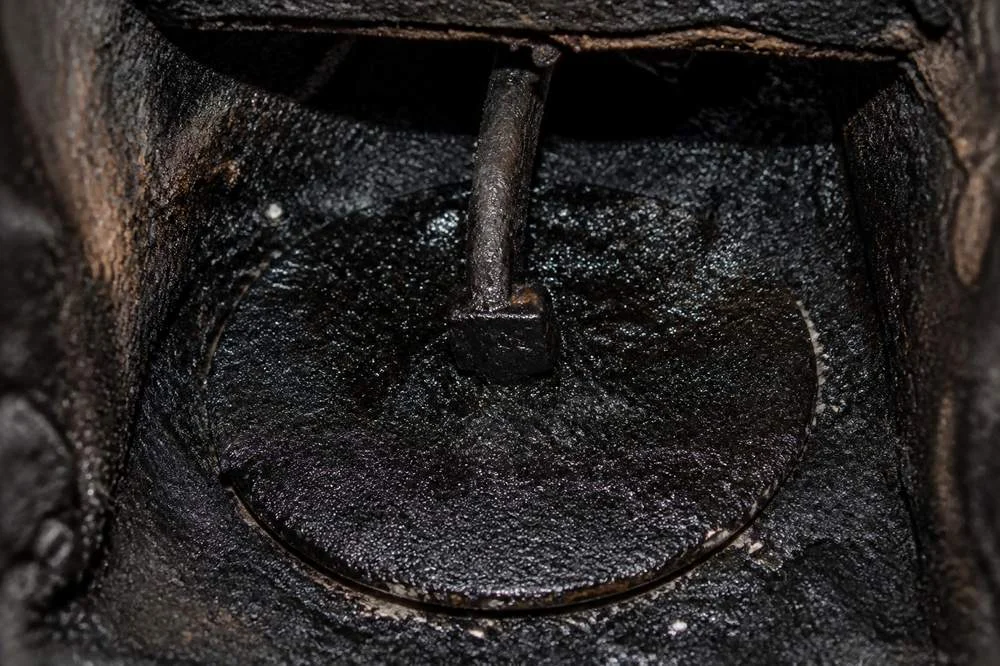 Glazed creosote deposits on a flue wall; illustrative image