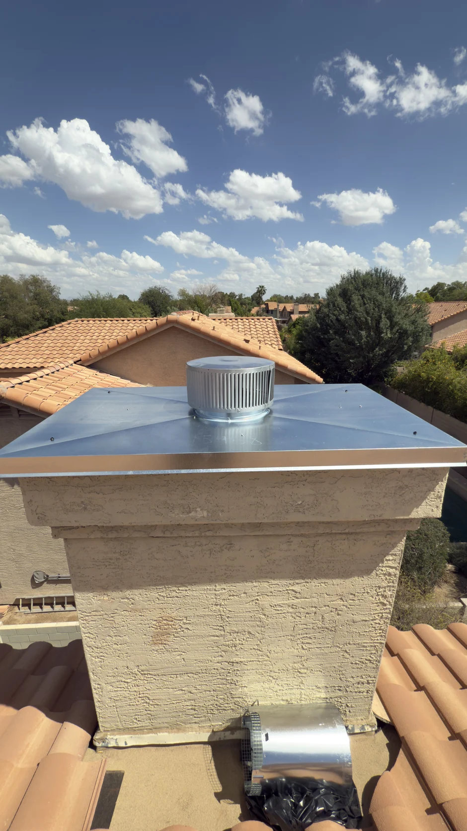 New chase cover and cap fitted on a chimney chase